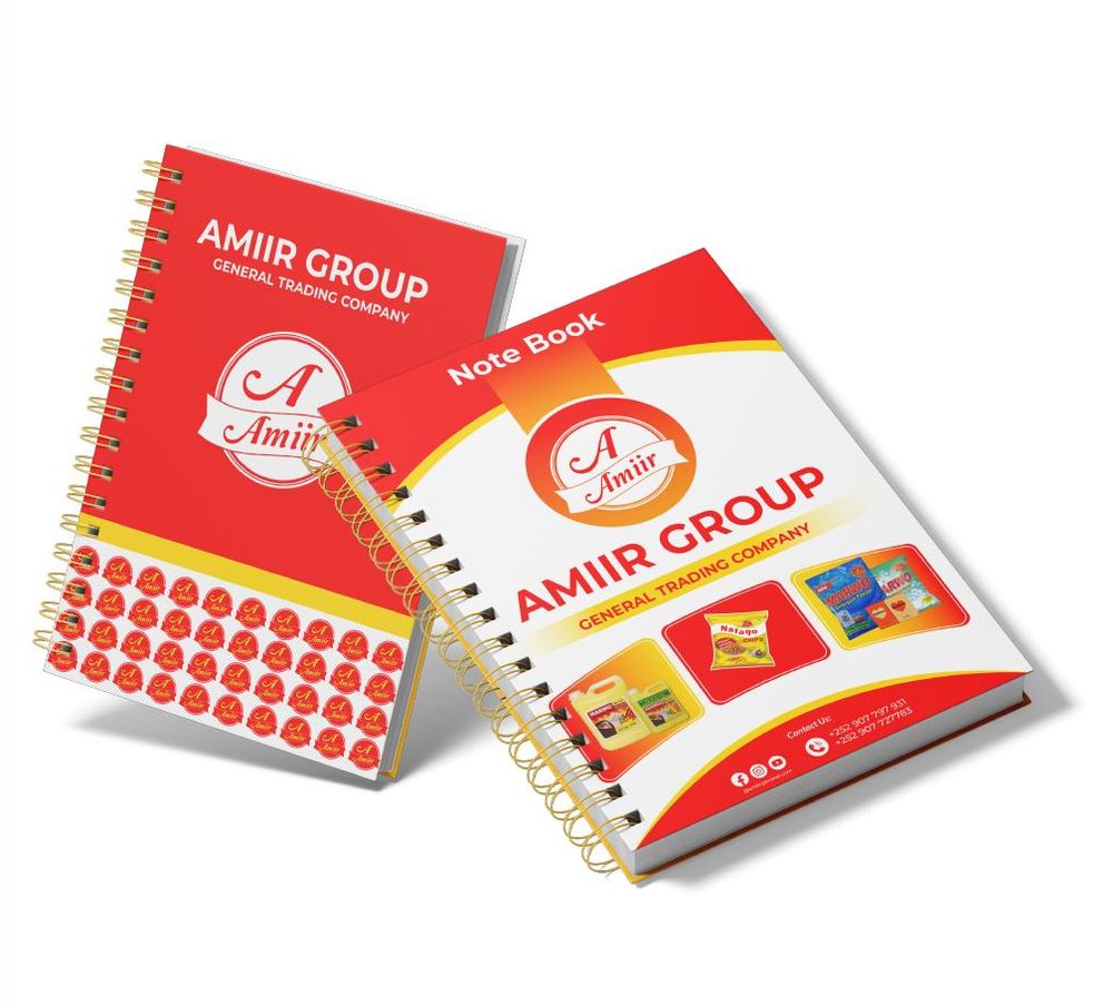 Branded spiral notebooks printed with the Amiir Group identity