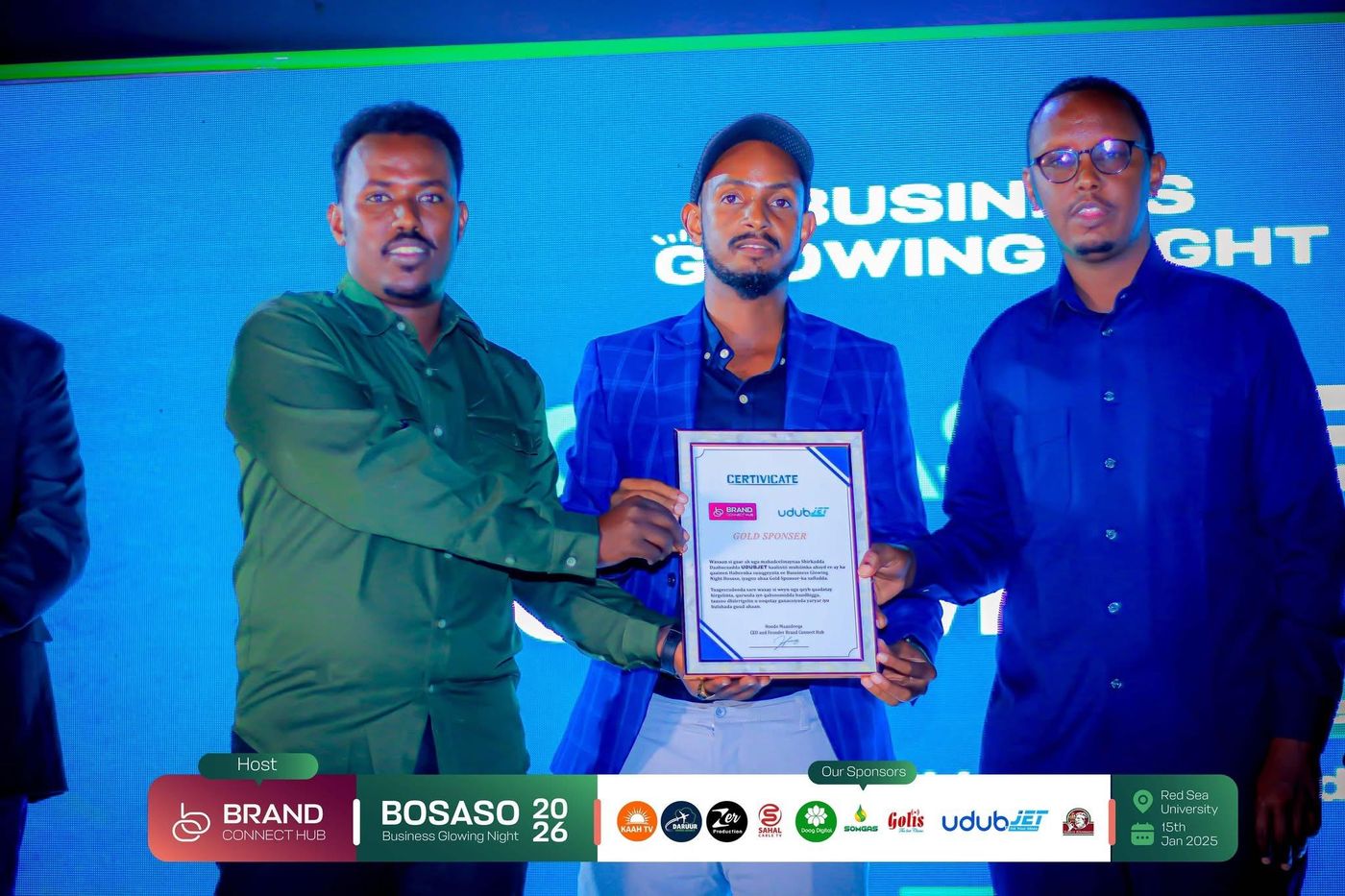 udubJET receiving the Gold Sponsor certificate at Business Glowing Night in Bosaso