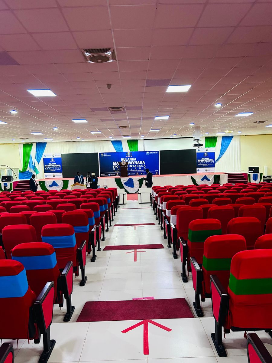 Conference hall stage branding and printed backdrops for the Puntland President and Youth meeting