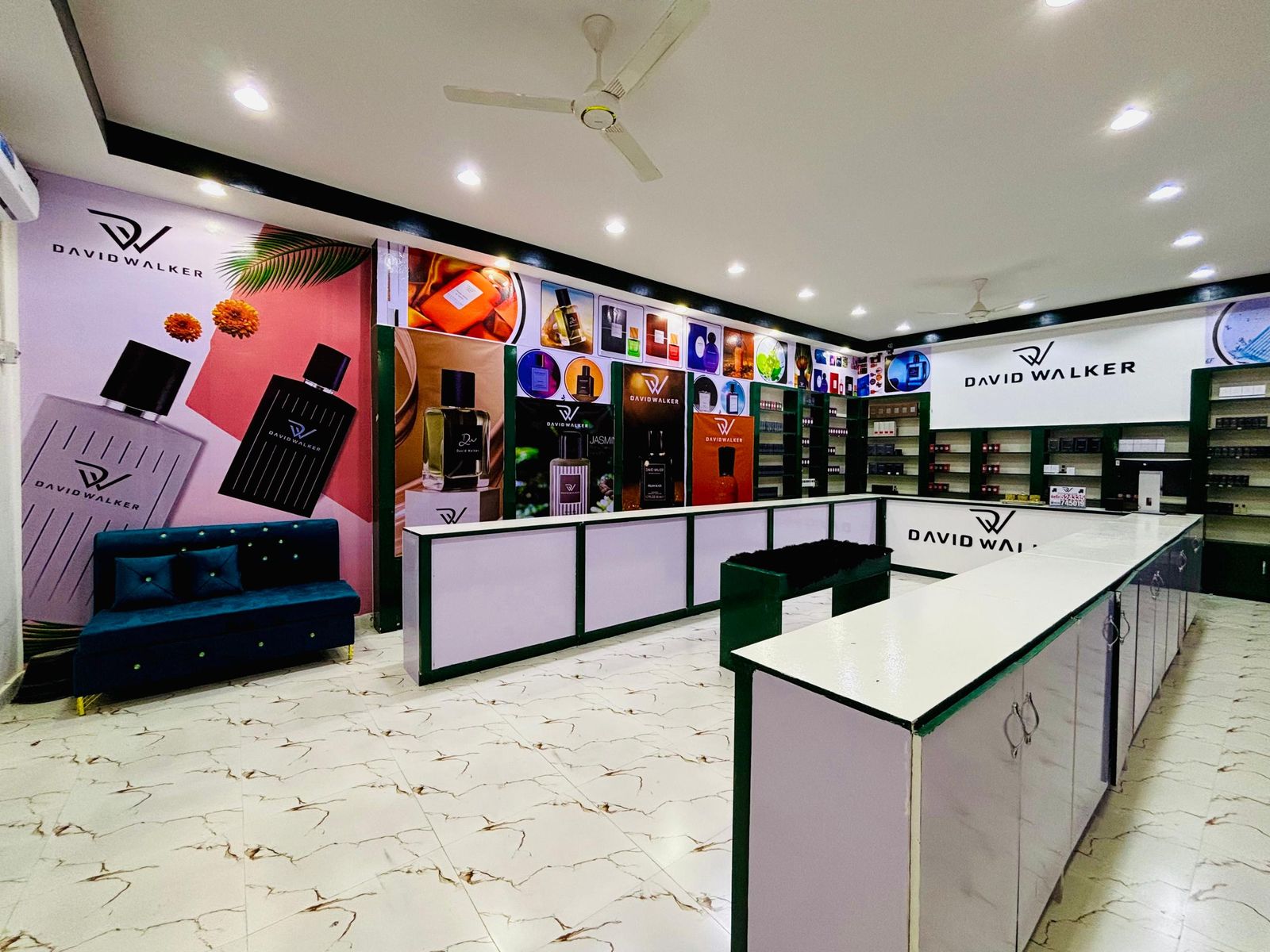 Retail fit-out with printed wall graphics and display panels for the David Walker perfume store, Garowe
